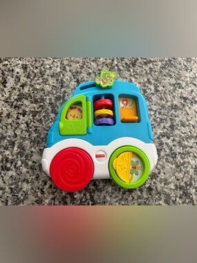 Fisher-Price Blue Bus Toy with Red, Green, Yellow & Purple Activity Parts